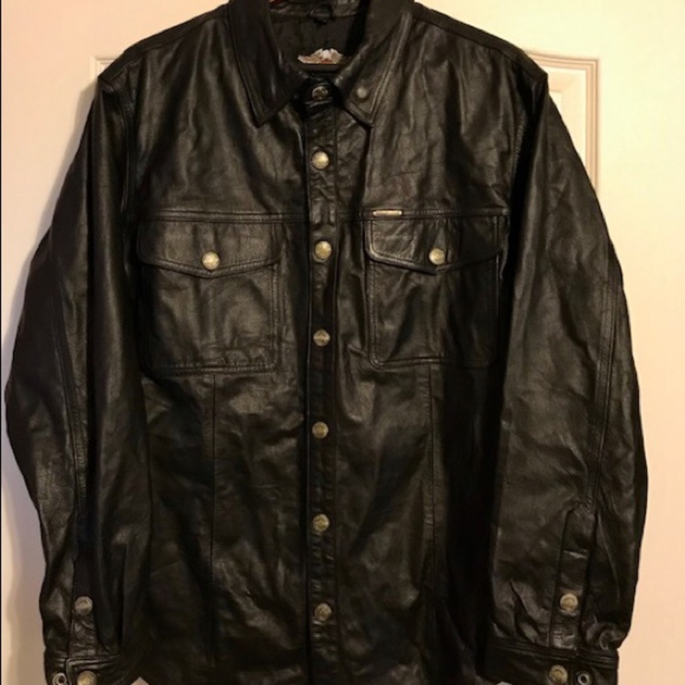 Men’s size large long sleeve leather shirt.